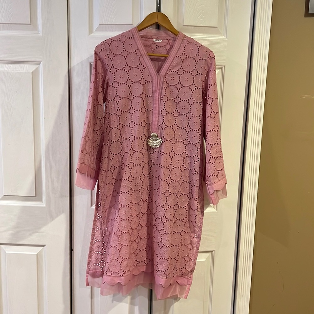 Tunic with eyelet threadwork